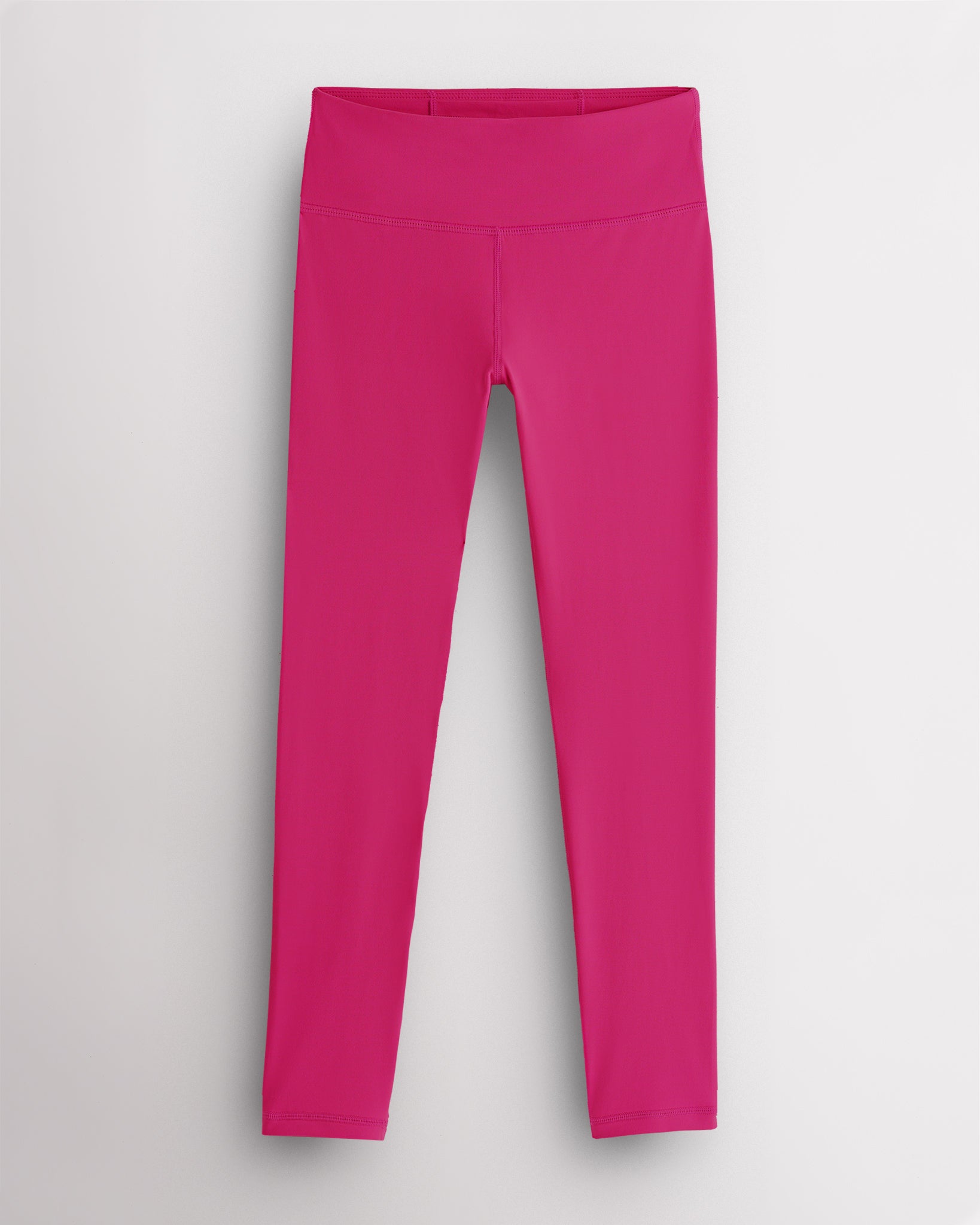 Hot pink girls soft yoga leggings with high-rise waistband, stretchy nylon-spandex fabric for comfortable everyday wear