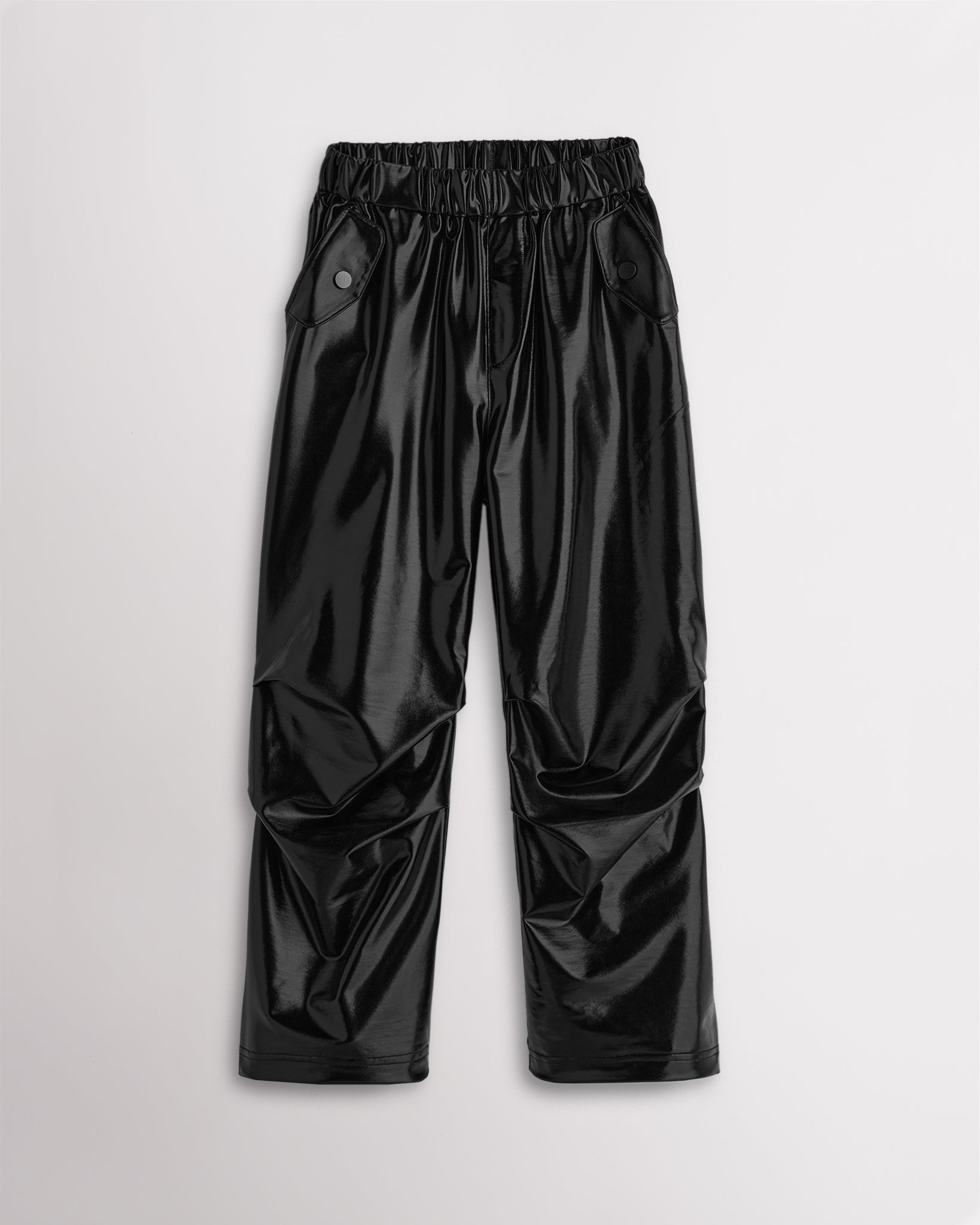 Girls patent black metallic cargo pants with a relaxed fit, elastic waistband, flap pockets, and straight wide-leg silhouette.
