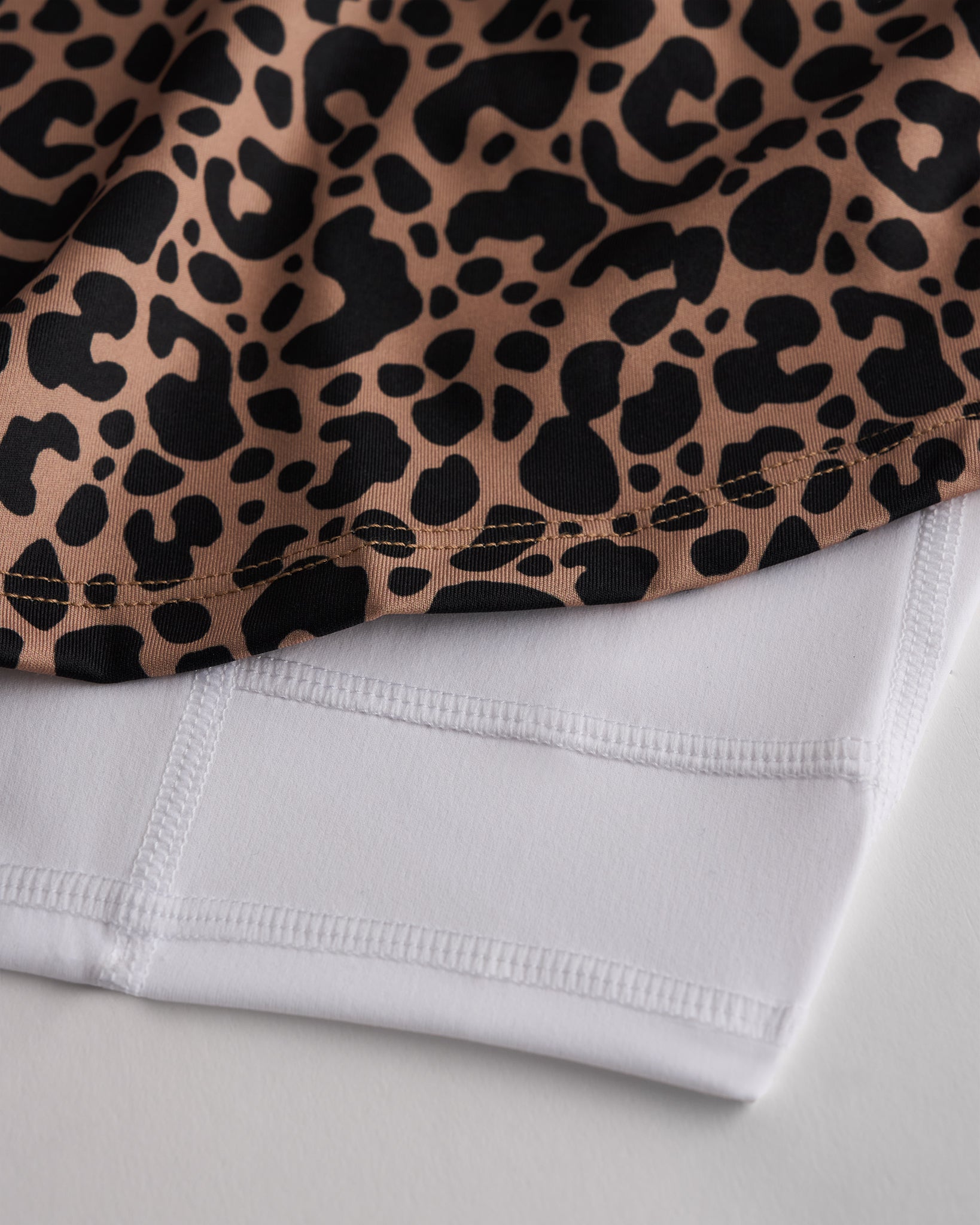 Close-up of tennis skirt fabric with built-in white shorts for coverage