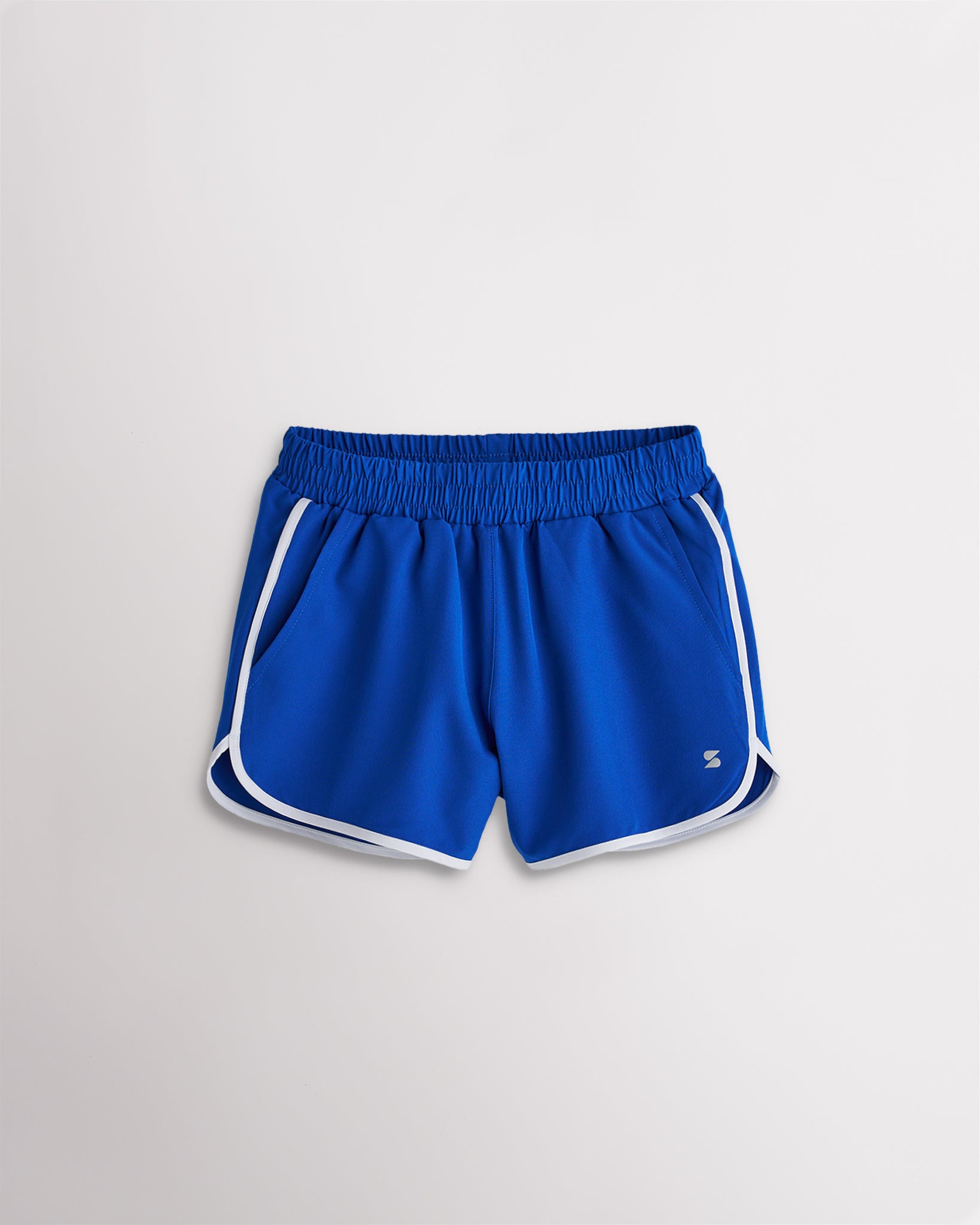Girls royal blue athletic shorts with white trim, a stretchy elastic waistband, curved hems, and lightweight sporty design.