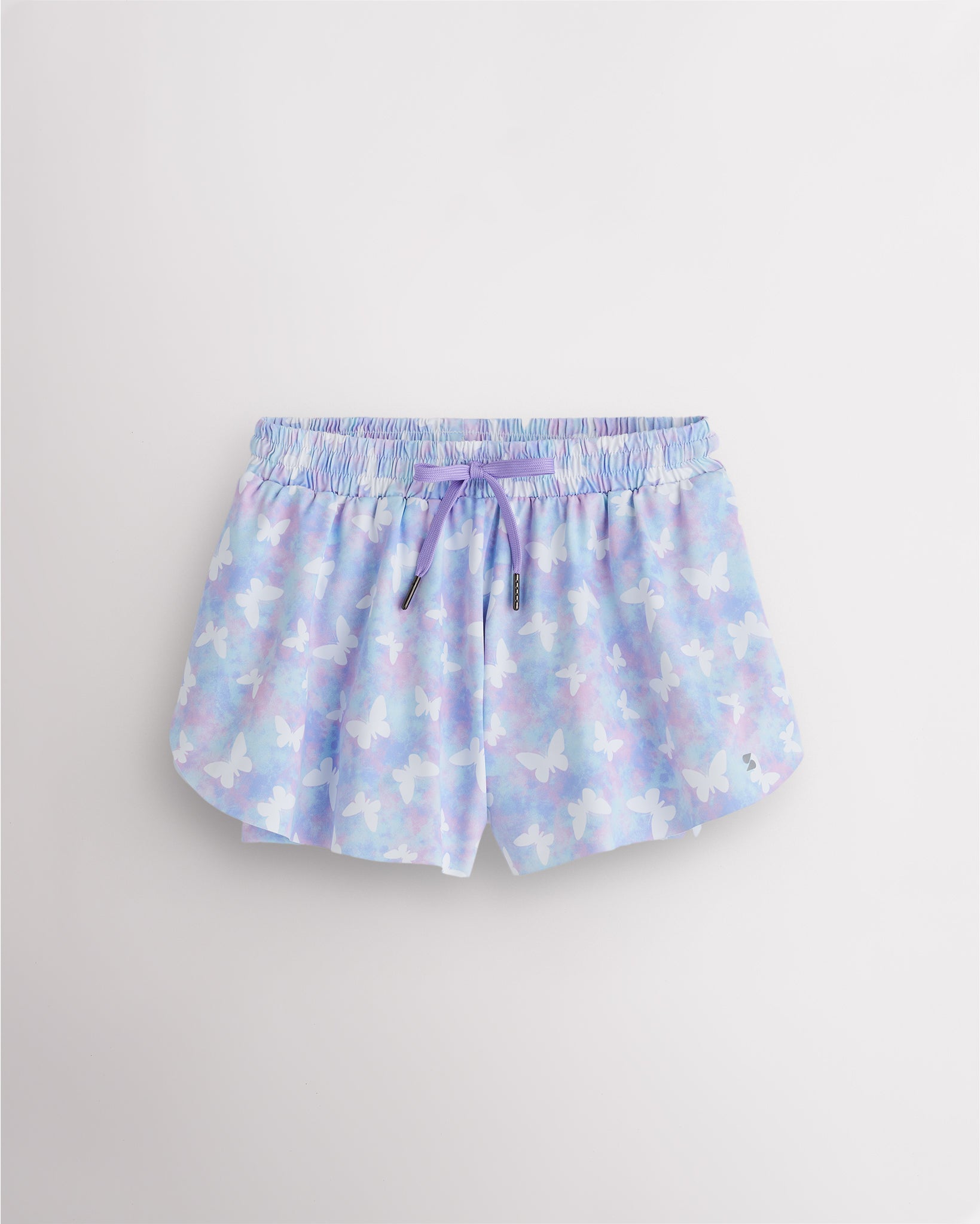 Magic Flutter girls flowy shorts with elastic waistband, pink drawstring, and layered 2-in-1 design.