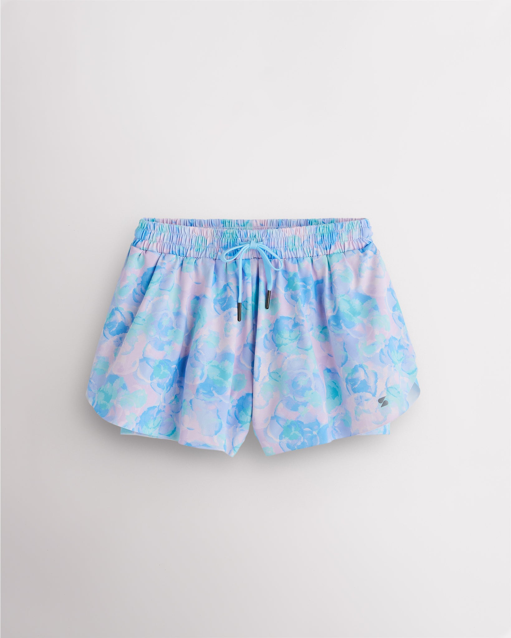 Watercolor Bloom girls flowy shorts with elastic waistband, pink drawstring, and layered 2-in-1 design.