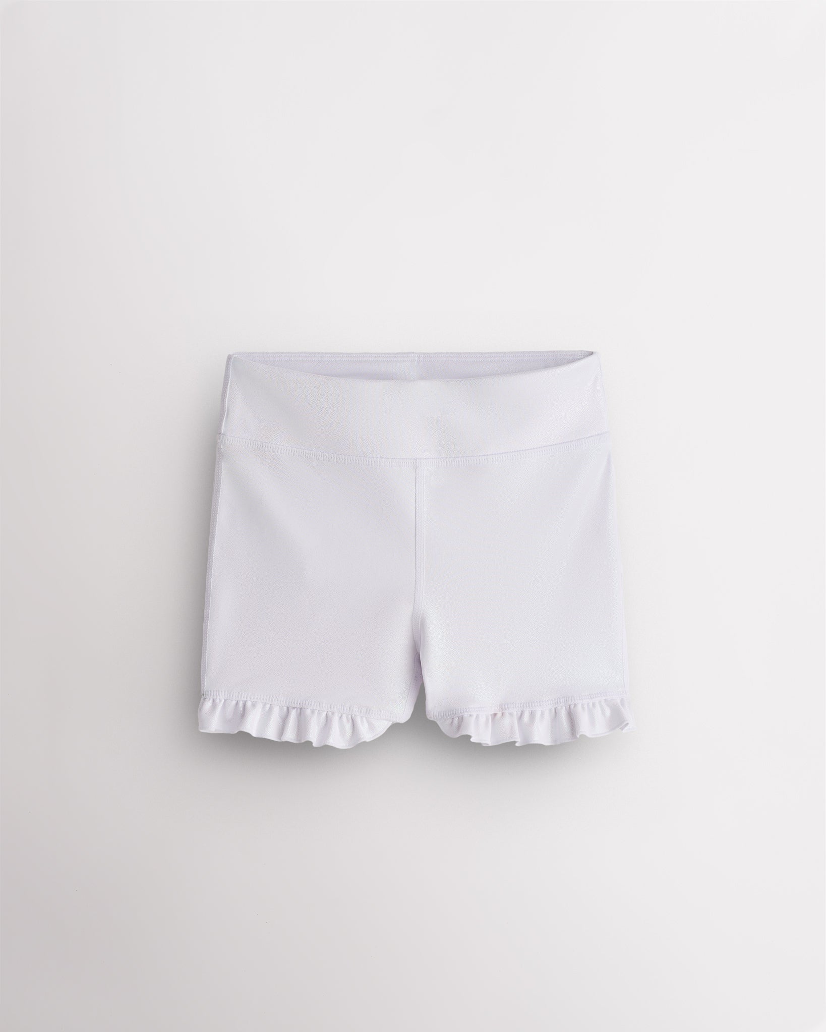 White Stelle Girls Shimmer Ruffle Active Short with high-waisted fit and ruffle hem