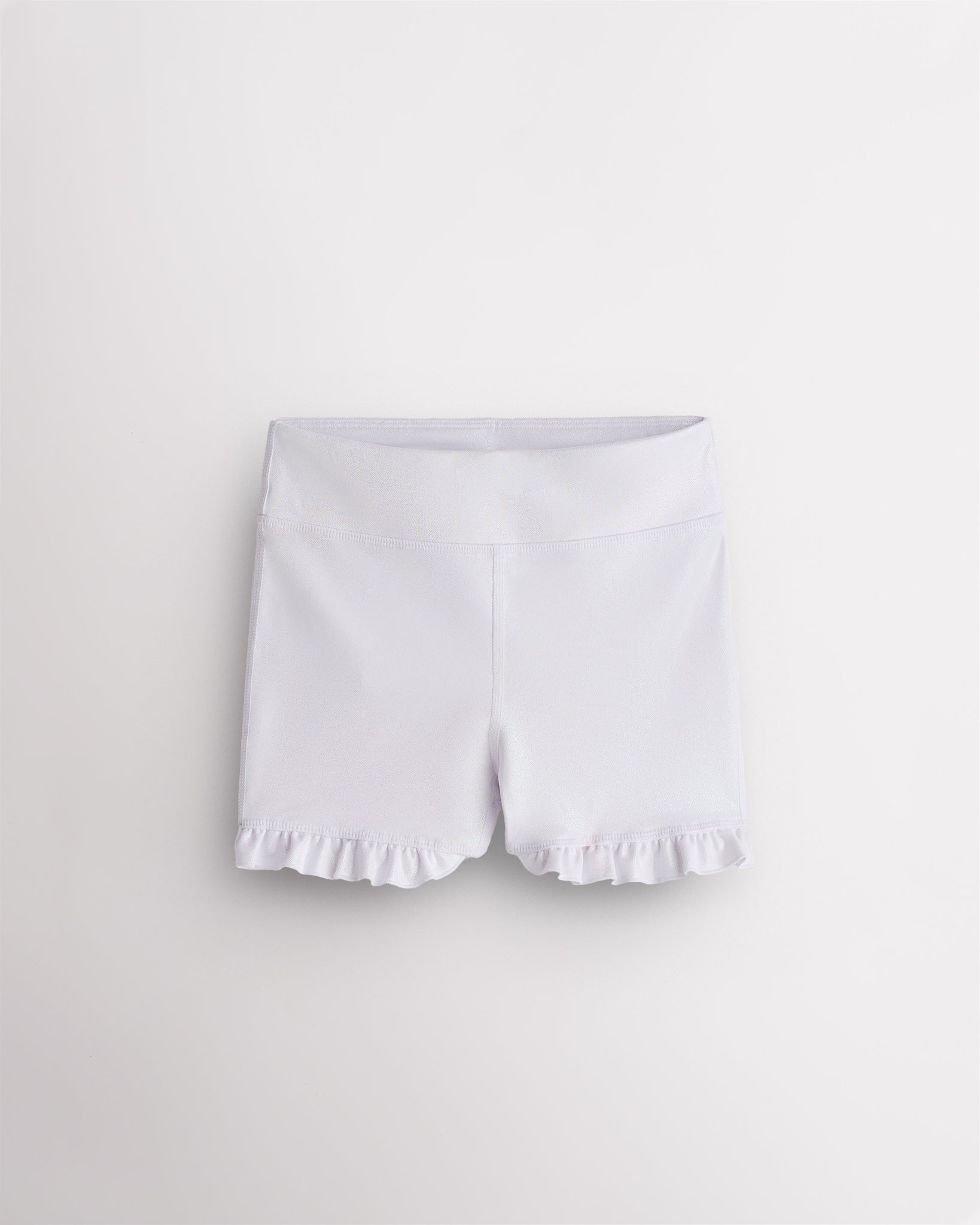 White Stelle Girls Shimmer Ruffle Active Short with high-waisted fit and ruffle hem