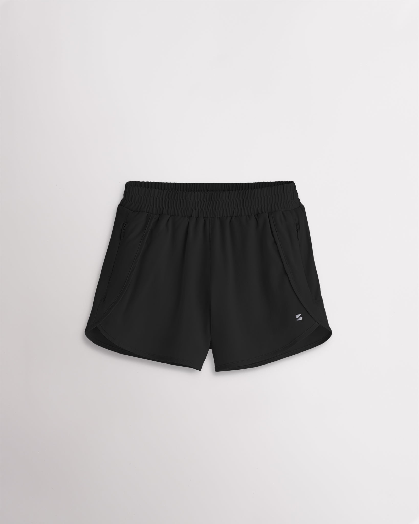 Girls black athletic running shorts with elastic waistband, curved hem, and lightweight design.