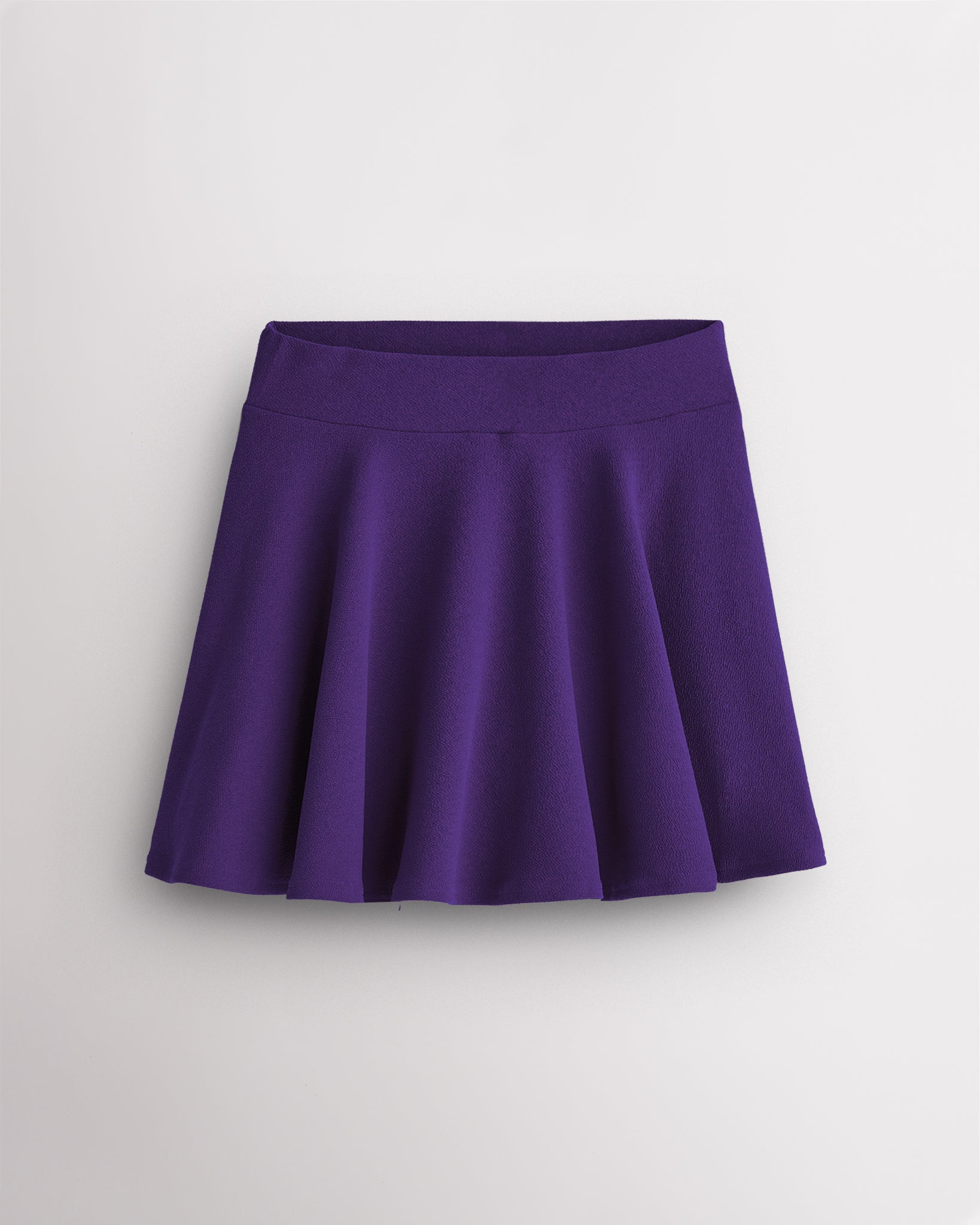 Purple girls casual skater skort with a flared A-line silhouette, elastic waistband, and built-in shorts design.