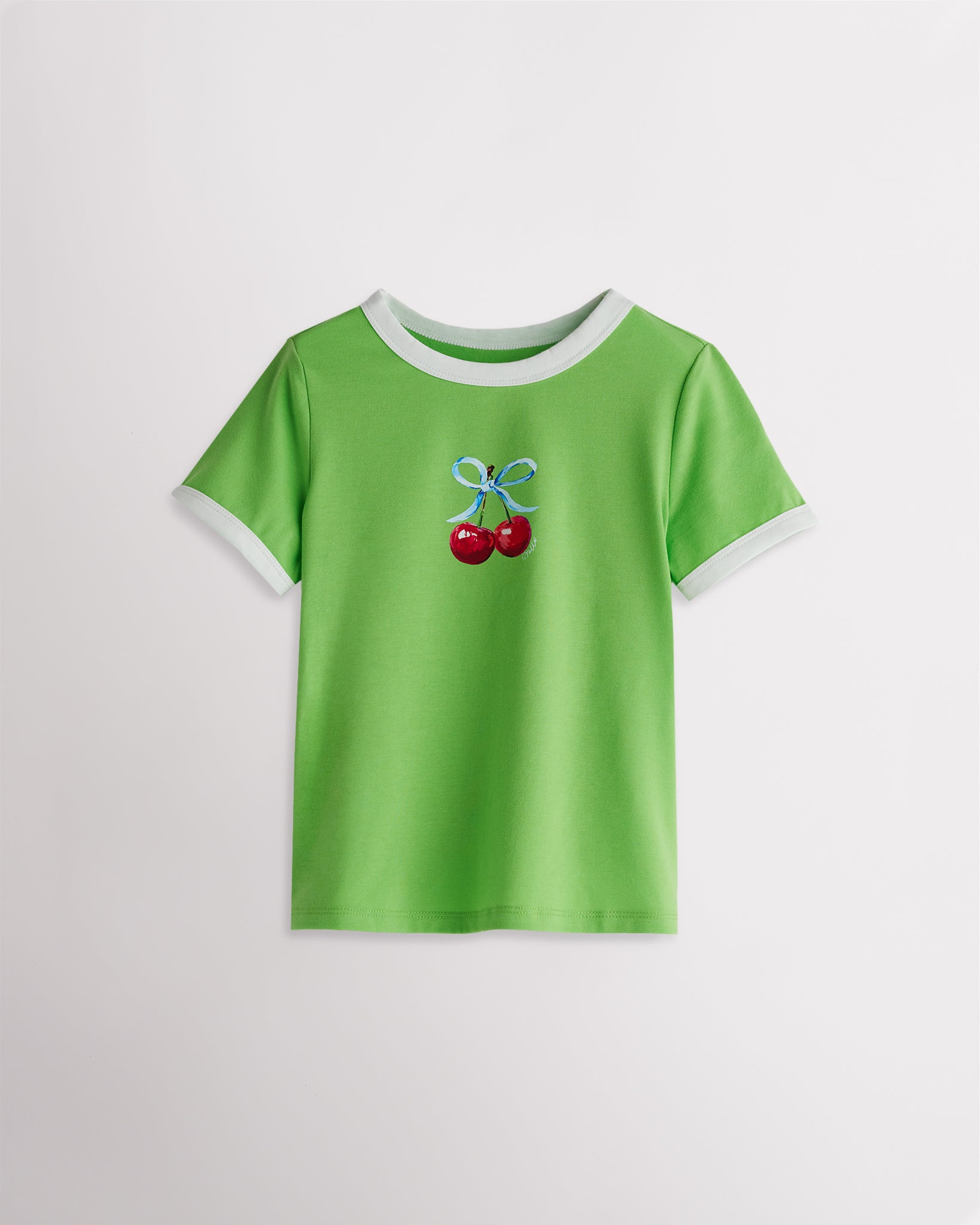 Kids green retro ringer graphic tee with white trim and cherry graphic, short sleeve casual kids t-shirt.