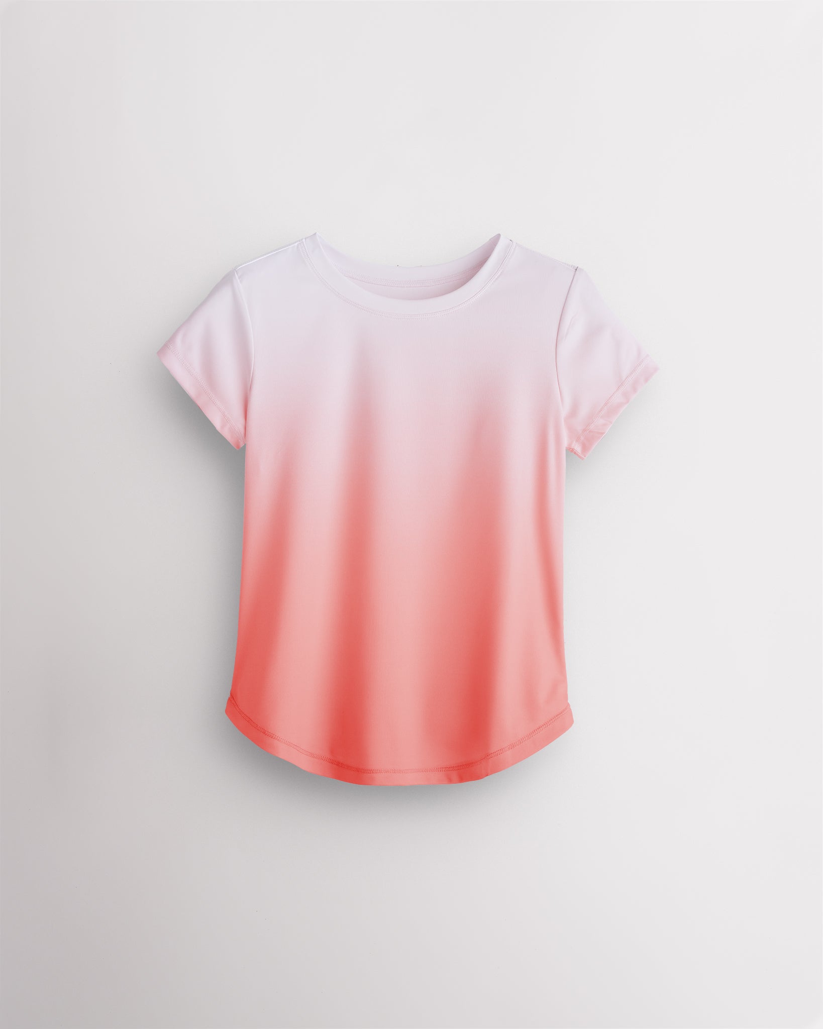 Coral ombre kids athletic T-shirt with short sleeves, crewneck, curved hem, and lightweight quick-drying fabric for sports and school.