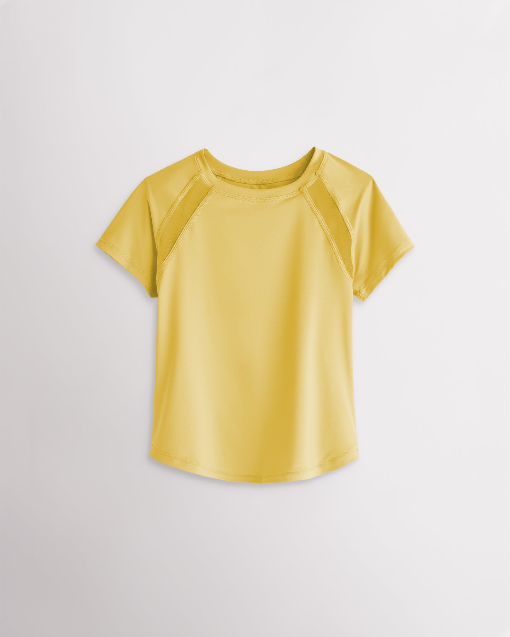 Kids yellow athletic t-shirt with mesh paneling and raglan sleeves, short sleeve breathable kids sports tee.