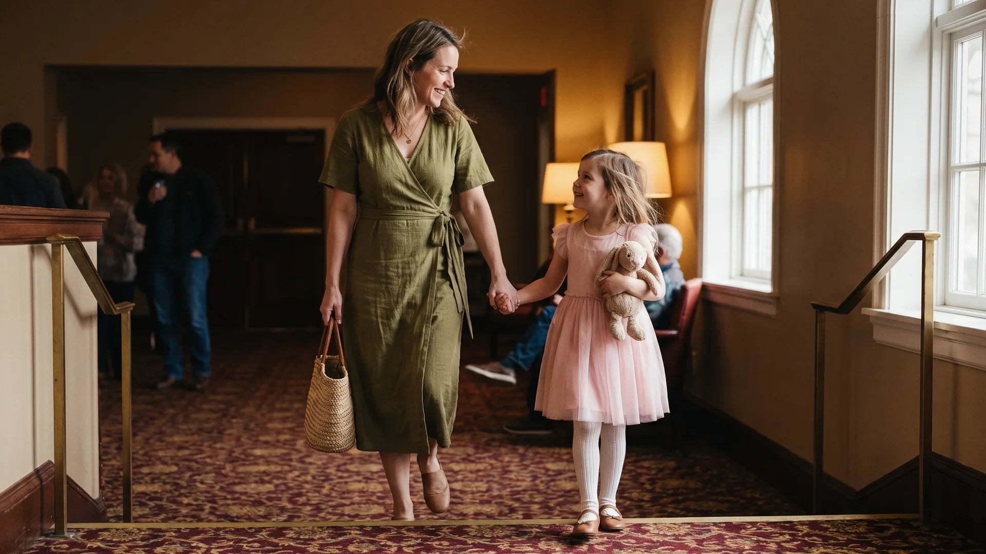 Mother and daughter dressed smart casual deciding what to wear to the ballet