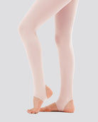 Beige tights worn by a person on a light gray background