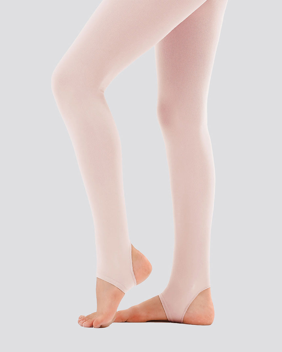 Beige tights worn by a person on a light gray background