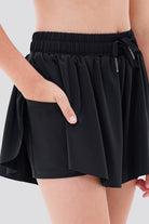 Close-up of black butterfly shorts