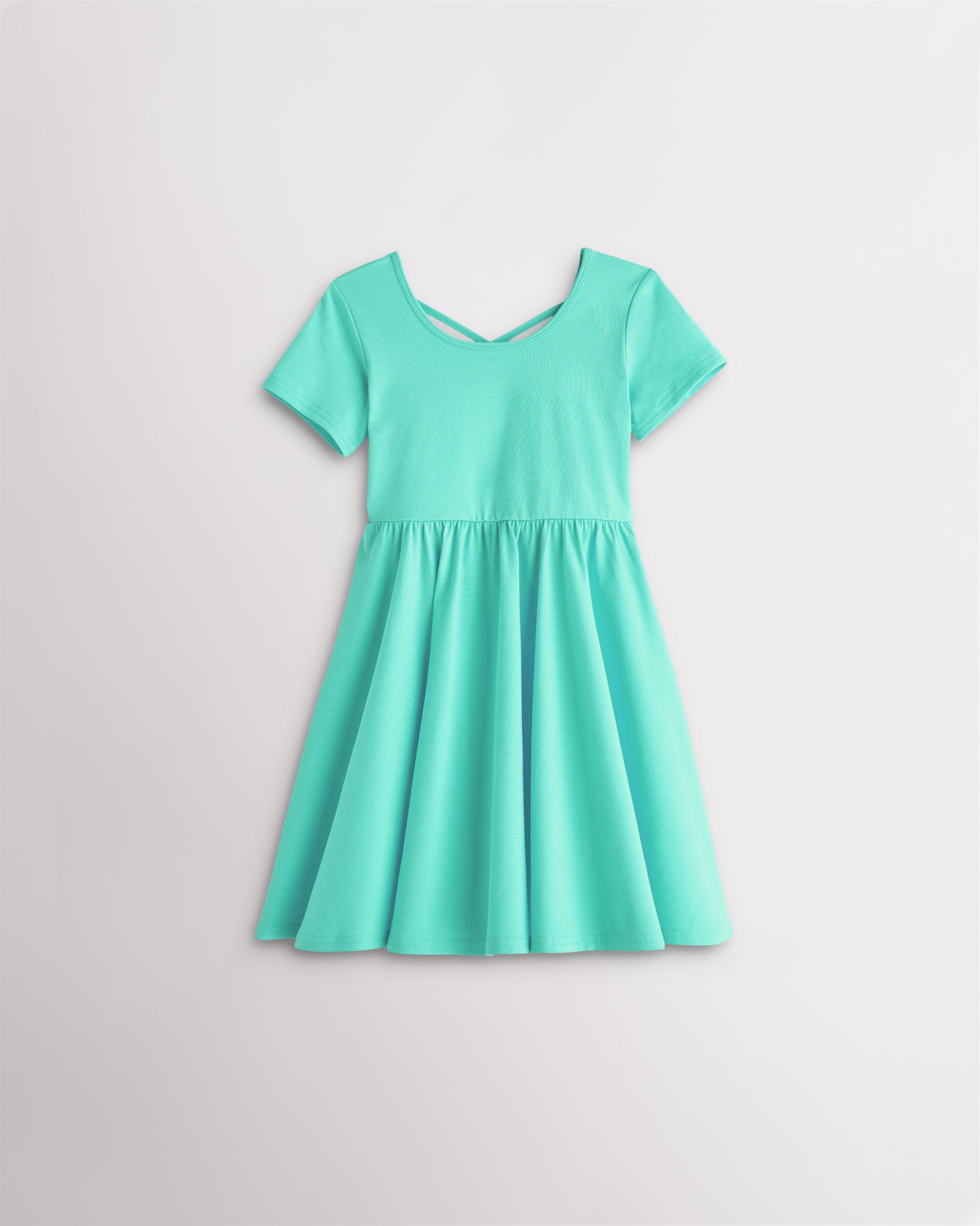 Girls mint green short sleeve A-line twirly dress with a flared skirt.