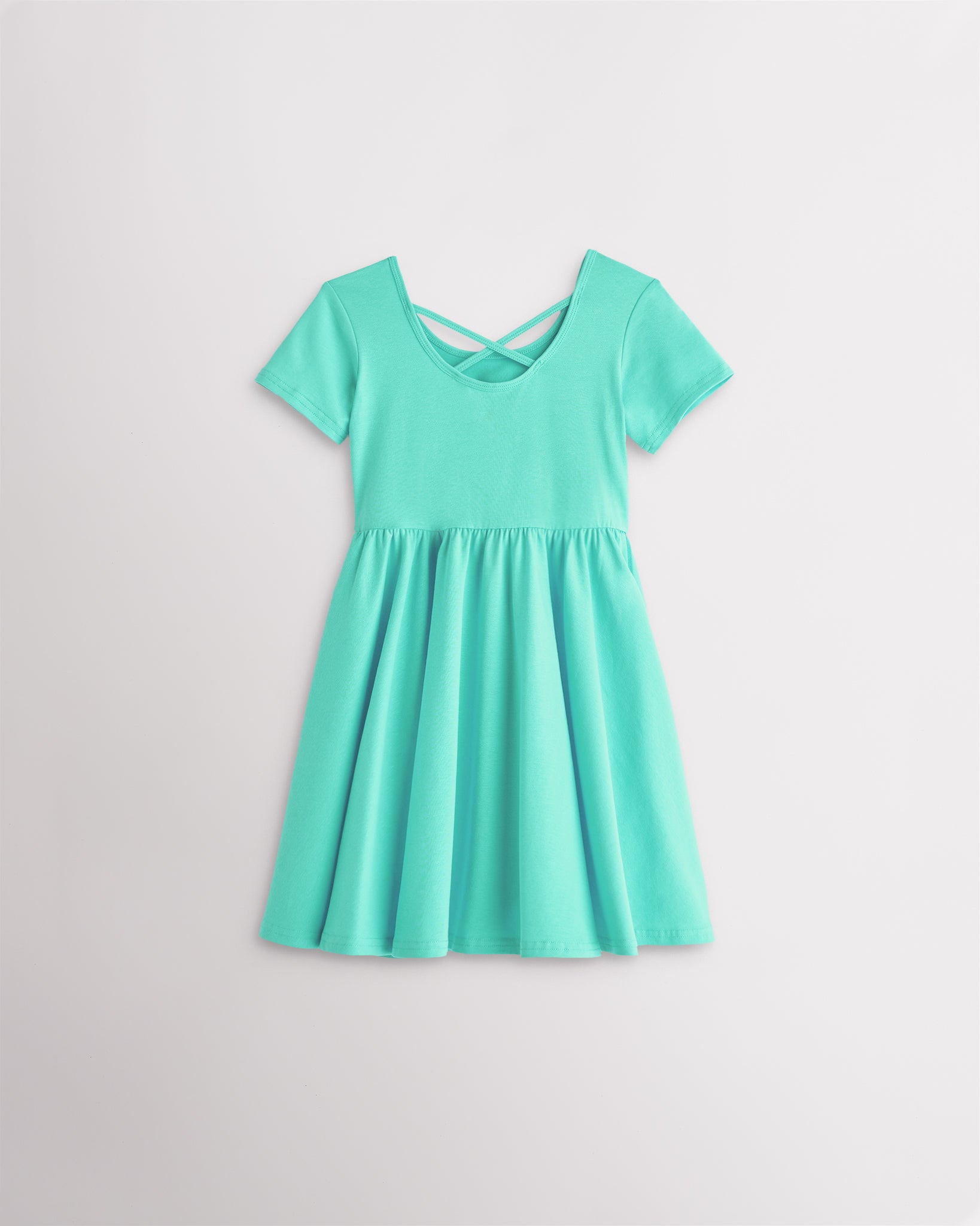 Girls mint green short sleeve A-line twirly dress with a flared skirt.