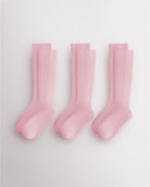Three pairs of pink kids ribbed calf socks with supportive no-slip fit and seamless toe design for school and everyday wear.