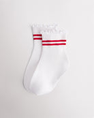 White kids socks with red sporty stripes, ribbed cuffs, and lettuce-edge ruffle trim