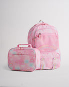 Pink Stelle kids backpack with matching lunch bag, rainbow print, front mesh pocket, and zipper compartments.
