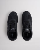 Black Studio air mesh cheer shoes with lace-up closure.