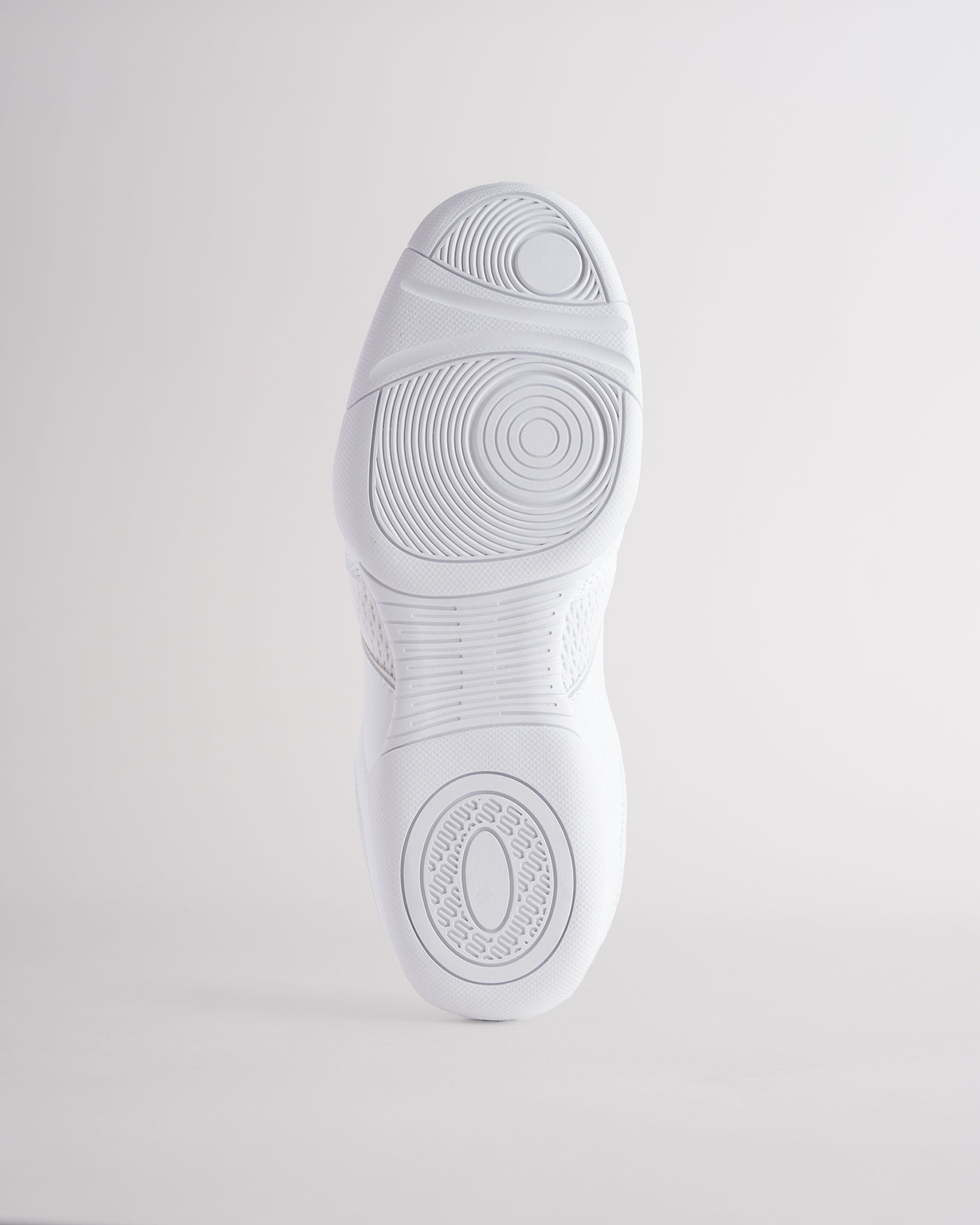 White Studio air mesh cheer shoes with lace-up closure.