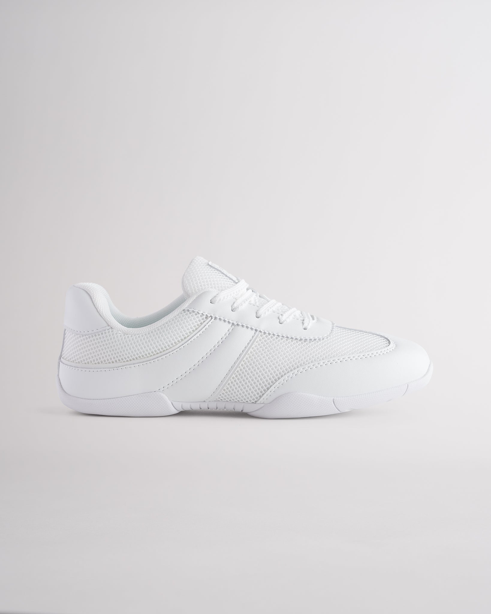 White Studio fine mesh cheer shoes with lace-up closure.