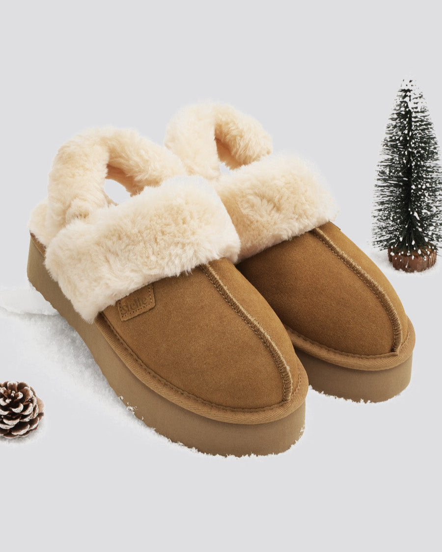 Platform slippers with classic brown suede uppers.