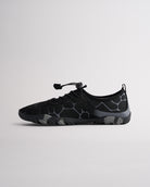 Angled view of black womens water shoes showing breathable mesh and flexible sole