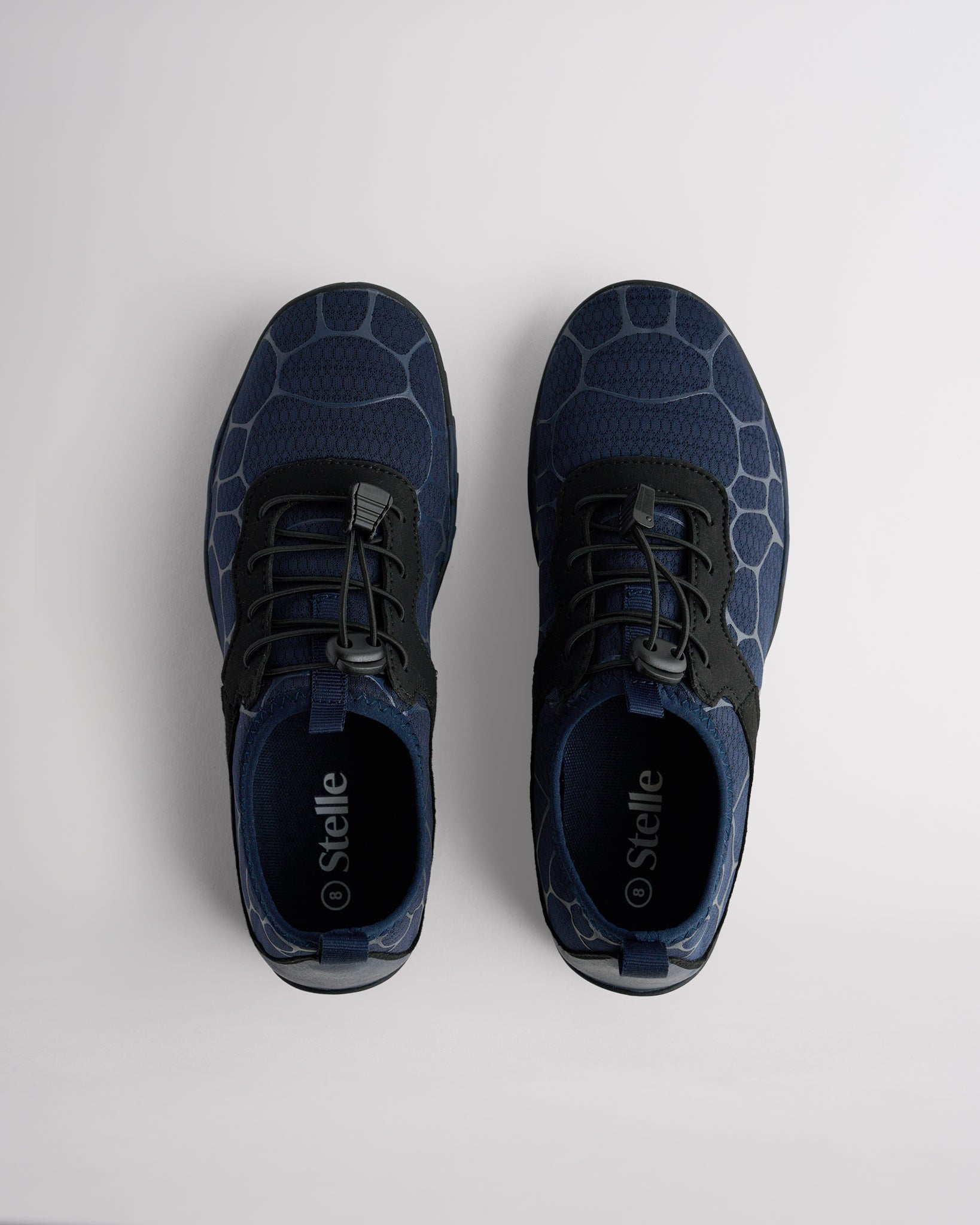 Top view of blue water shoes for women with adjustable speed laces and roomy toe box