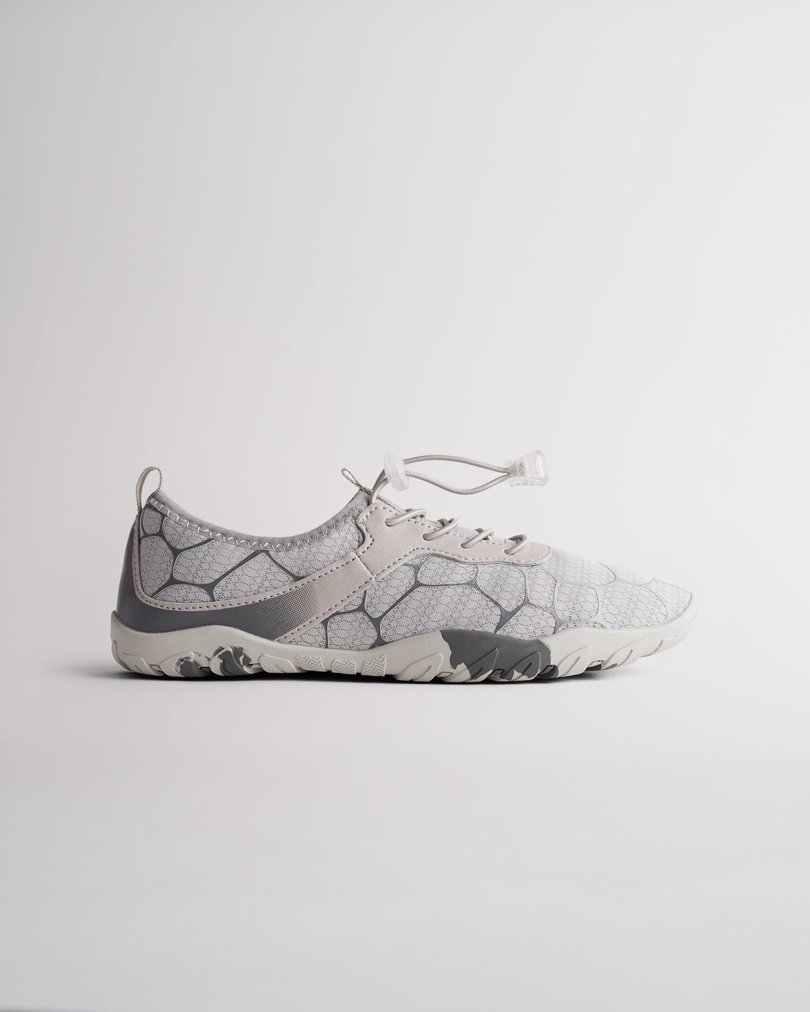 Chalk women’s water shoes with mesh upper and speed lace system, side profile view