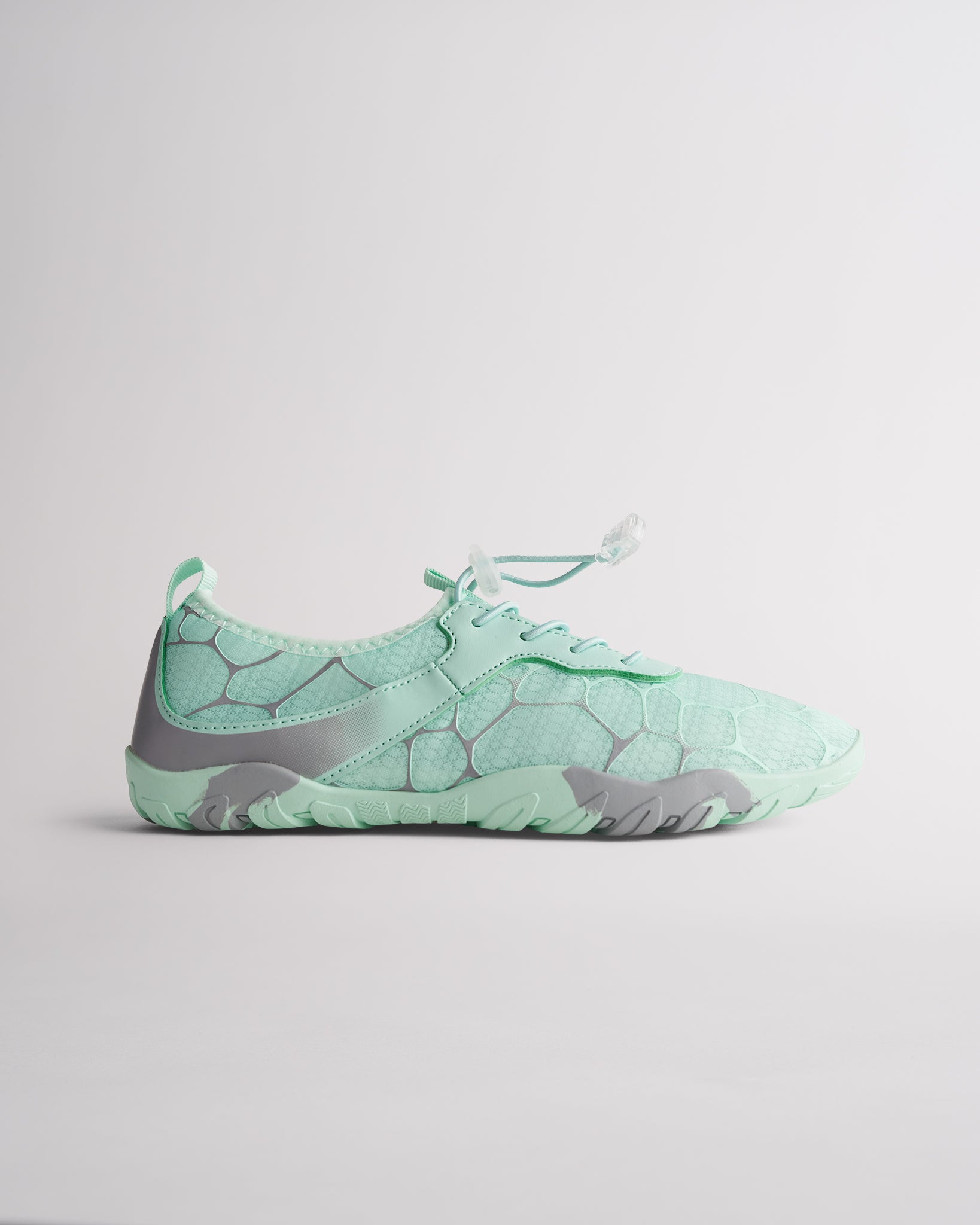 Mint green women’s water shoes with mesh upper and speed lace system, side profile view
