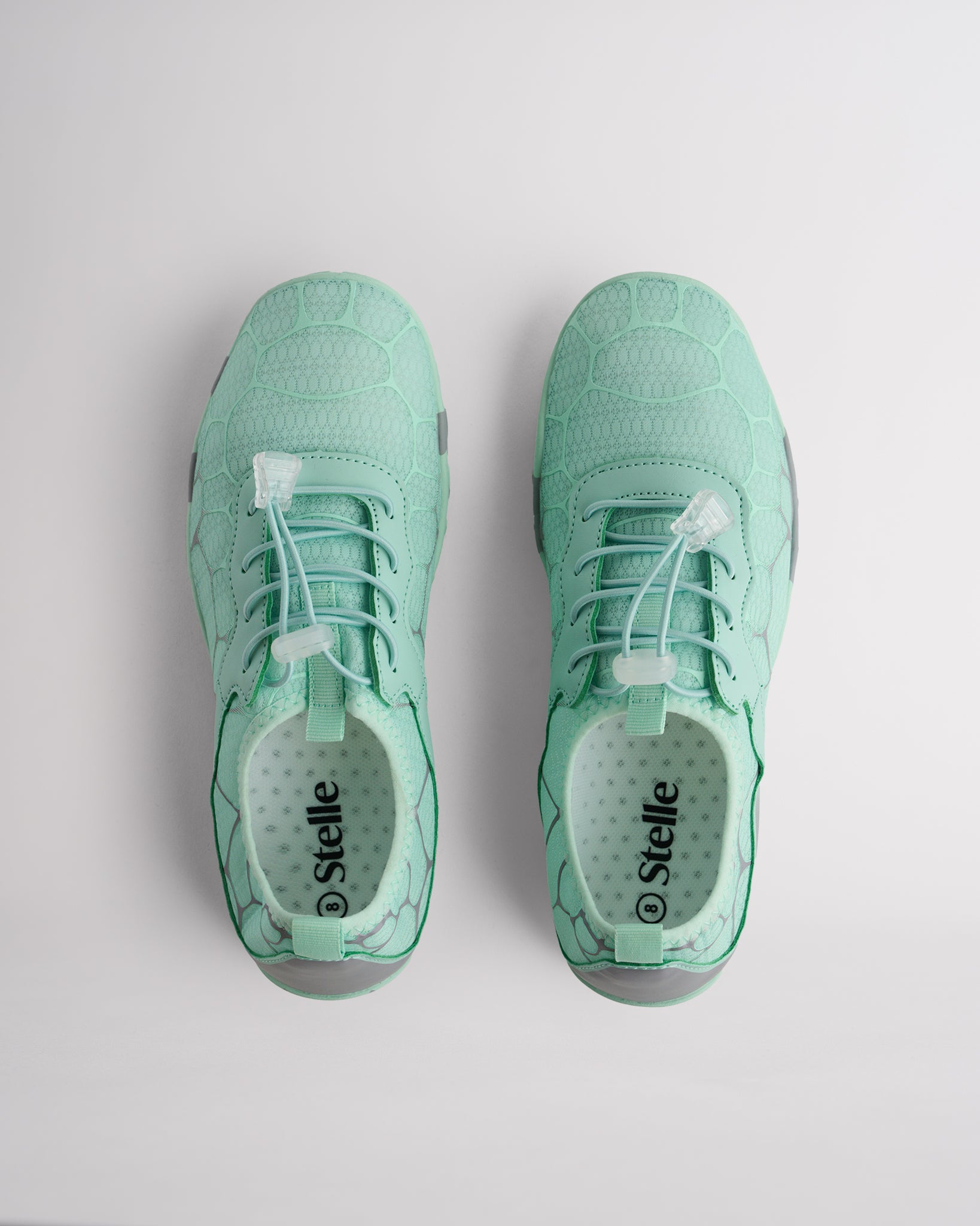 Top view of mint green water shoes for women with adjustable speed laces and roomy toe box