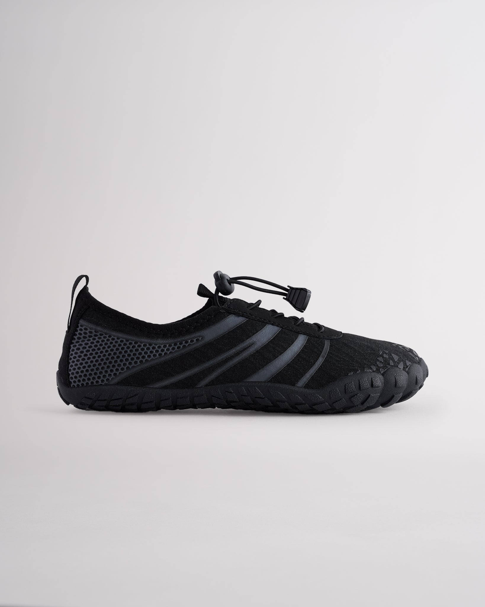 Black women’s water shoes with mesh upper and speed lace system, side profile