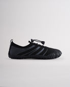 Black women’s water shoes with mesh upper and speed lace system, side profile