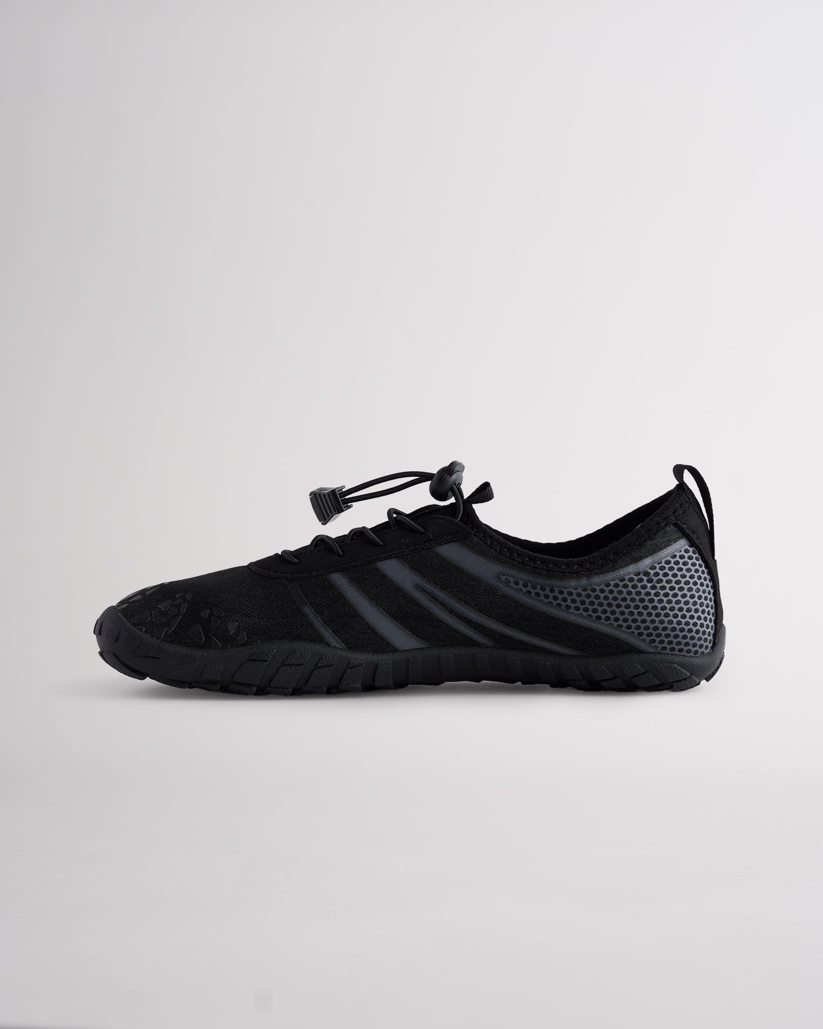 Side angle of womens water shoes showing breathable mesh design and dual pull tabs