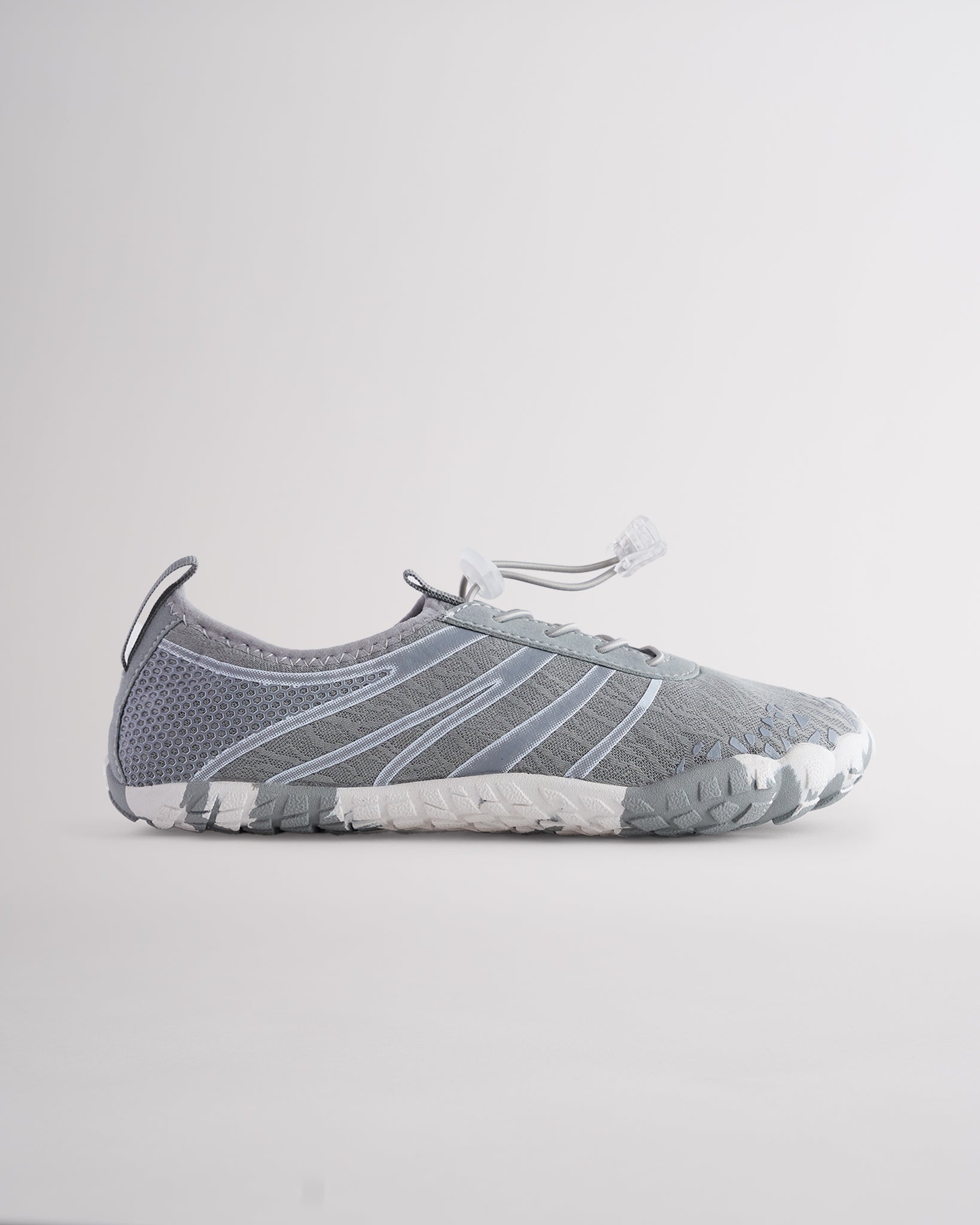 Grey women’s water shoes with mesh upper and speed lace system, side profile