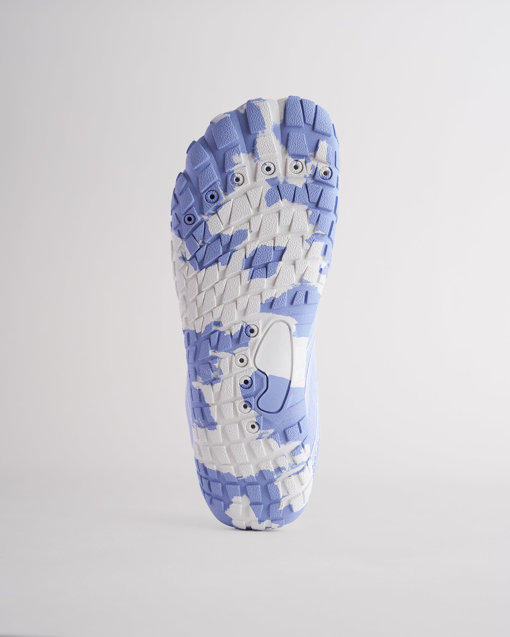 Bottom view of water shoes with textured traction outsole and drainage holes