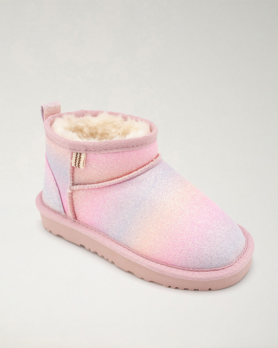 Pastel gradient snow boot with pink and purple tones on a light gray background