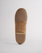 Bottom view of latte jazz shoe with textured split soles designed for flexibility, grip, and smooth dance movement.