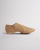 Tan adult vegan leather jazz shoe with easy slip-on style, flexible neoprene arch, and low heel.