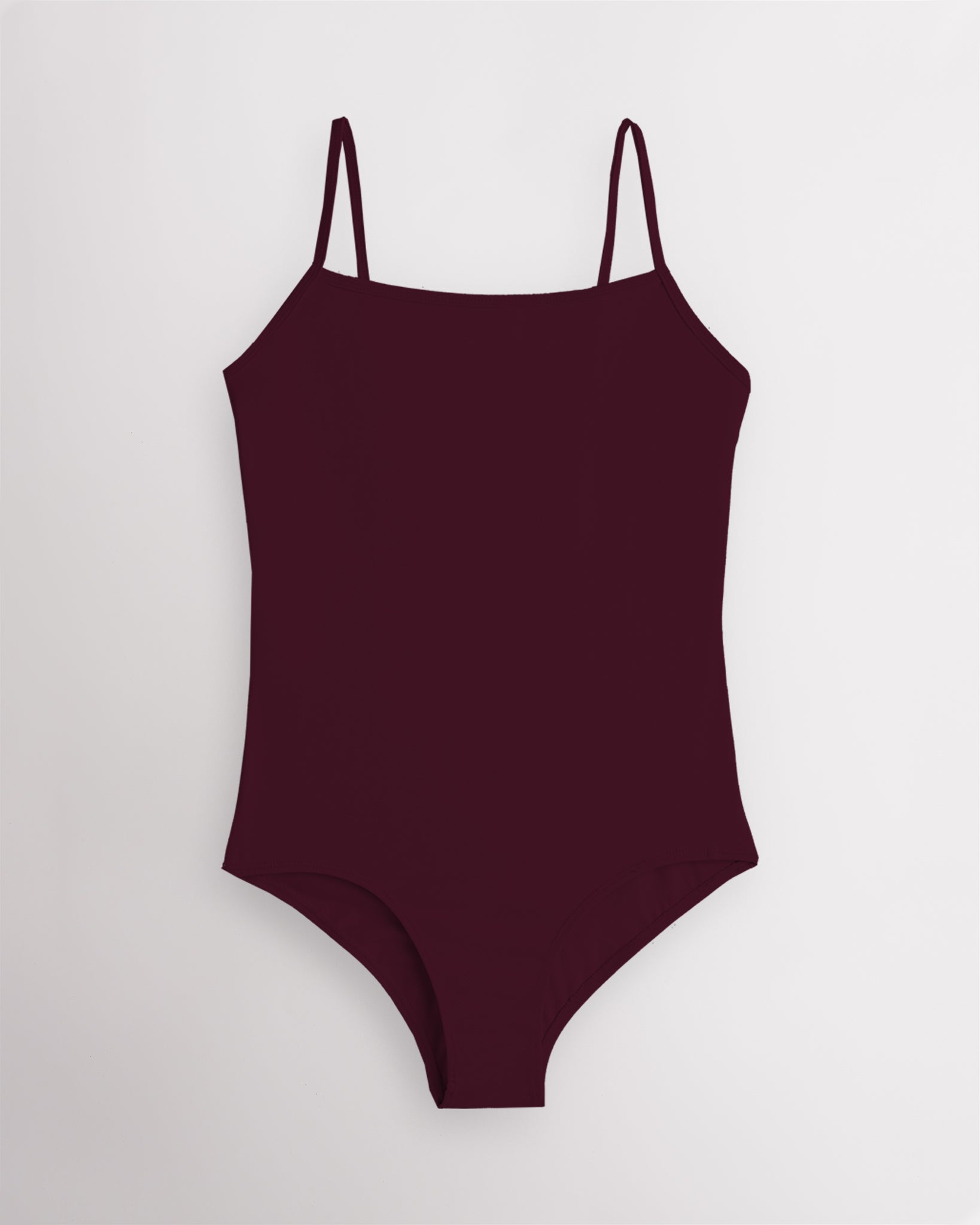 Cherry performance leotard for women with adjustable spaghetti straps, scoop neckline, supportive shelf lining, and a fitted silhouette for ballet and dance.