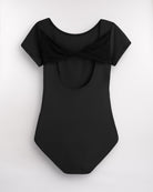 Back view of Black women’s dance leotard with twisted mesh detail and open-back silhouette.