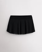 Black pull on dance skirt with high-low hem, lightweight flowing fabric, and subtle shimmer finish for elegant movement