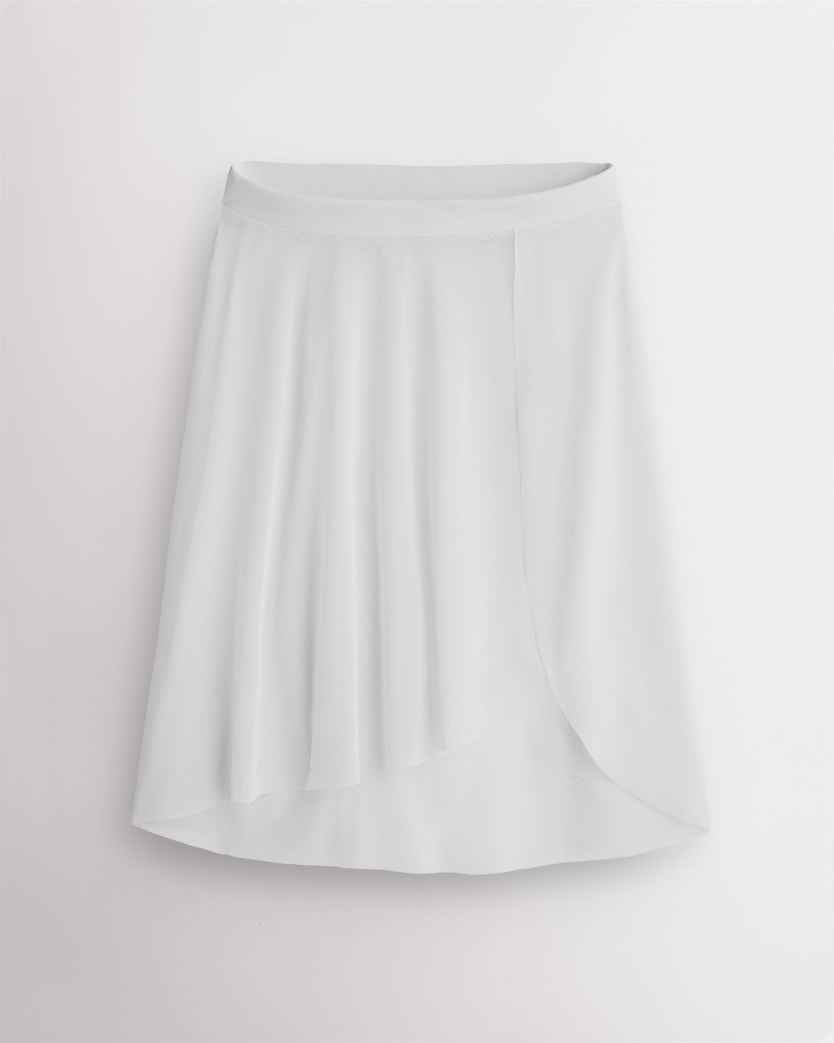 White ballet skirt with asymmetrical petal hem and flowy lightweight mesh design