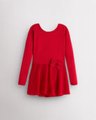 Red girls long sleeve dance dress laid flat with crew neckline, attached chiffon wrap skirt, and bow detail.