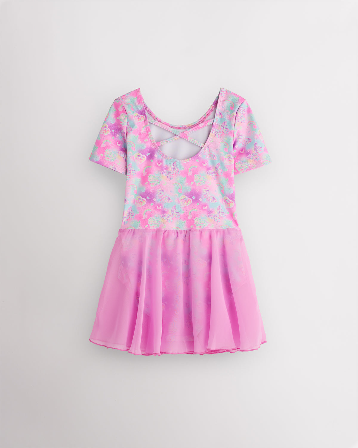 Back view of Bow Dreams dance ballet dress with short sleeves, crisscross back detail, shimmering print, and attached skirt.