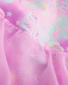 Close-up of Bow Dreams ballet dress showing the pink shimmering print and lightweight skirt fabric.