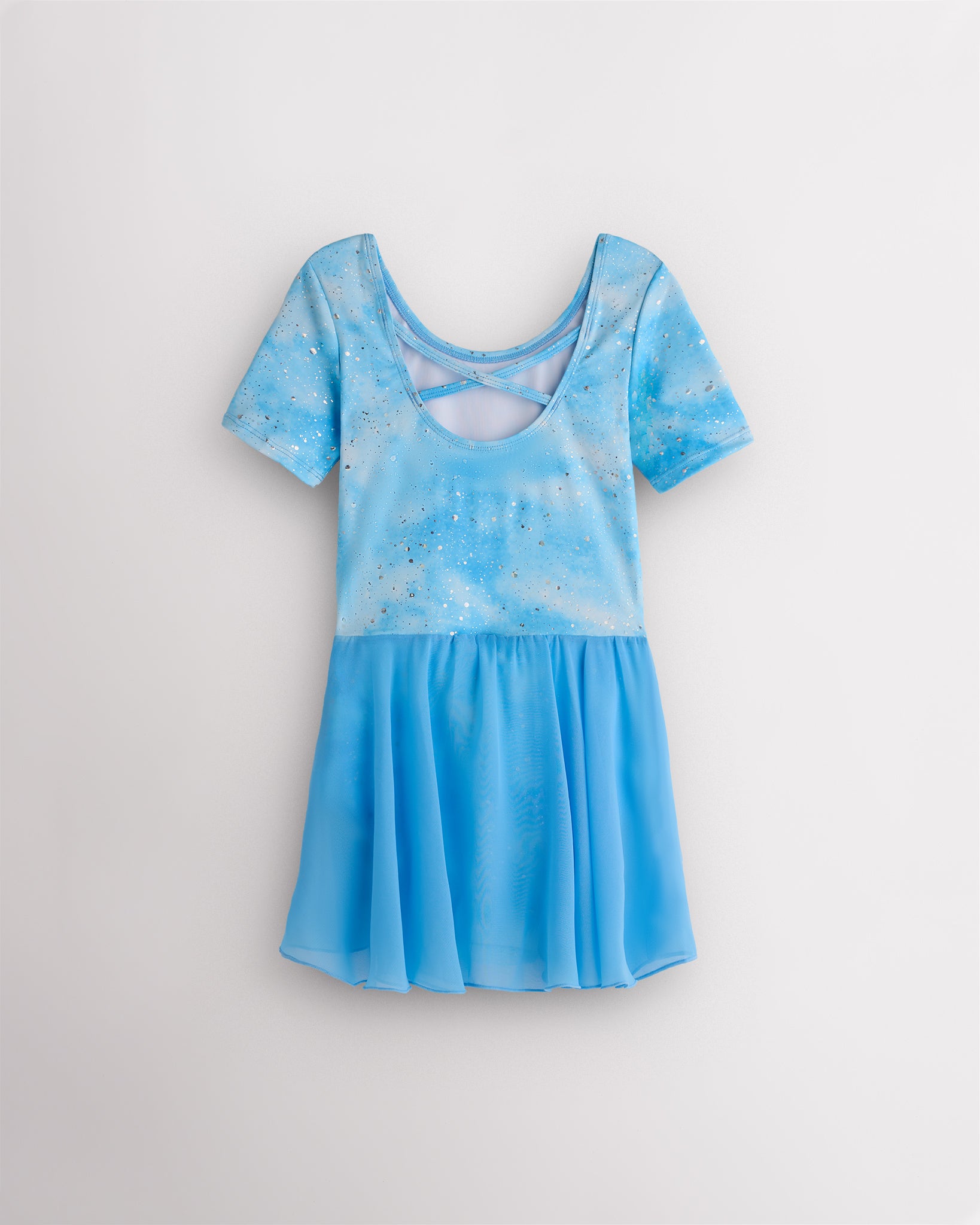 Back view of Cloudburst Blue dance ballet dress with crisscross back detail, short sleeves, and attached skirt.