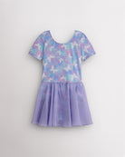Magic Flutter girls short sleeve ballet dress with pastel butterfly print, round neckline, and lavender attached skirt.