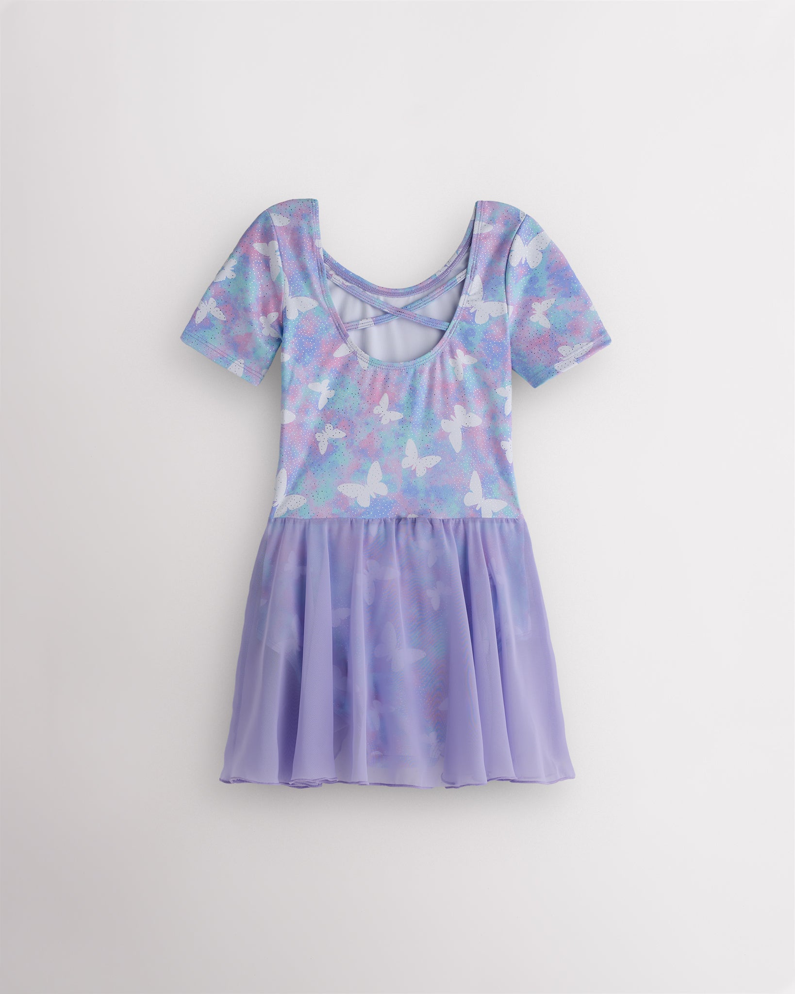 Back view of Magic Flutter dance ballet dress with crisscross back detail, butterfly print, and lavender skirt.