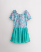 Mermaid Sparkle girls short sleeve ballet dress with aqua and pink shimmering print, round neckline, and turquoise attached skirt.